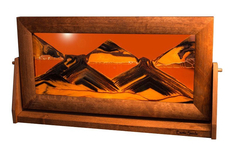 XL Moving Sand Art Picture by Exotic Sands, made in America. Features an alder wood frame with a swivel stand, showcasing desert sands flowing through a vibrant sunset orange liquid.
