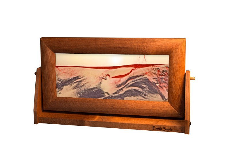 3D Sand Art in an alder wood frame and swivel stand with clear liquid, ever-changing black & white sands accented with red glitter. Made in USA