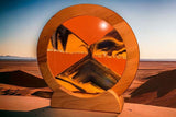 Sand art picture by Exotic Sands USA Round cherry wood frame with coral pink sand and desert sunset liquid