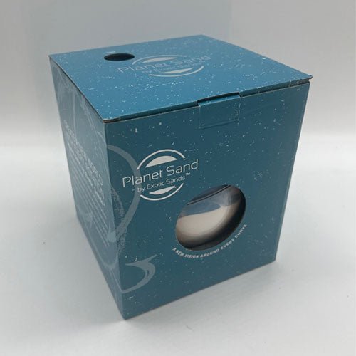 A Planet Sand Globe with dry-sifted black and white sands and shimmering blue glitter, displayed on a black easel stand. Moving sand art piece made in America. moving sand art pictures