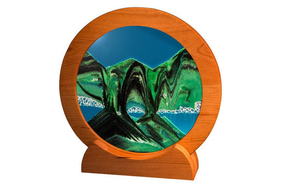 Sand art picture by Exotic Sands USA Round cherry wood frame with green sand and turquoise liquid