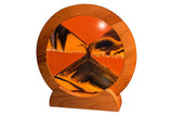Sand art picture by Exotic Sands USA Round cherry wood frame with coral pink sand and desert sunset liquid